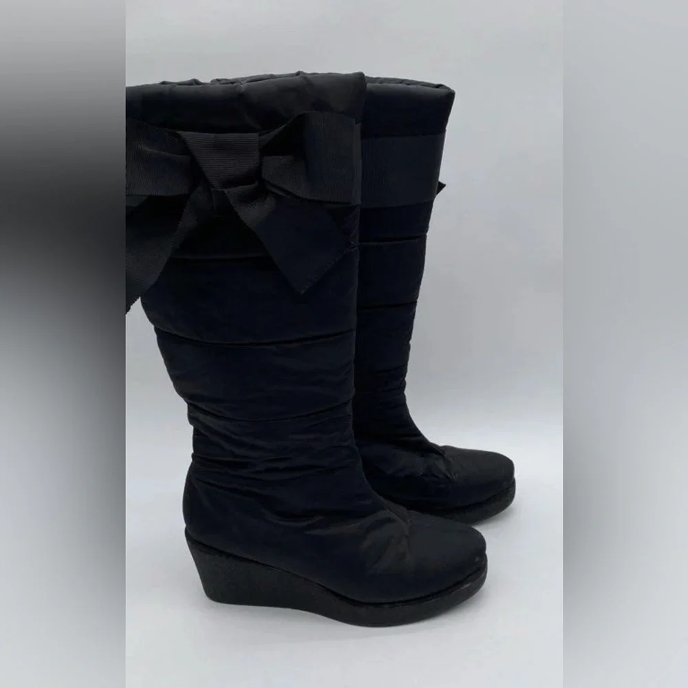 Kate Spade New York woman's Cagney black Quilted Wedge Heel snow boots